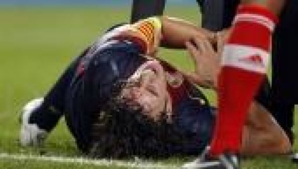 Vidéo choc : Puyol se retourne le coude contre Benfica