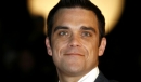 Robbie Williams surprend un fan sur Chatroulette.